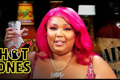 Lizzo Earns Her Hot Sauce Crown While Eating Spicy Wings