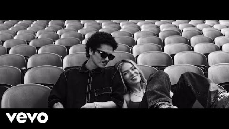 Bruno Mars and KAROL G Get Emotional on “Still”